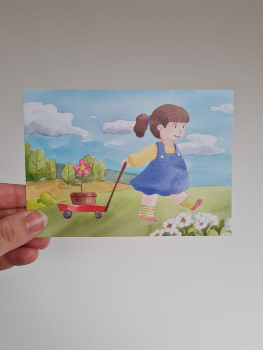 Meisje met karretje en plant – Ansichtkaart