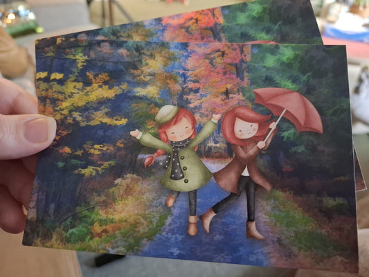 Twee vrouwen in herfstbos – Ansichtkaart