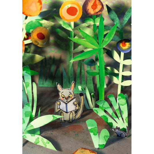 Poes leest tussen Bloemen – Ansichtkaart
